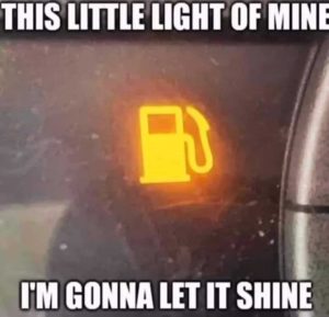 low fuel gas light in car dashboard