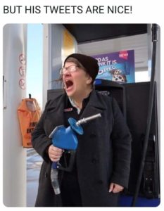 woman holding gas pump