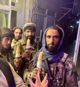 taliban fighters eating ice cream