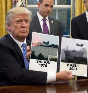trump holding saigon image