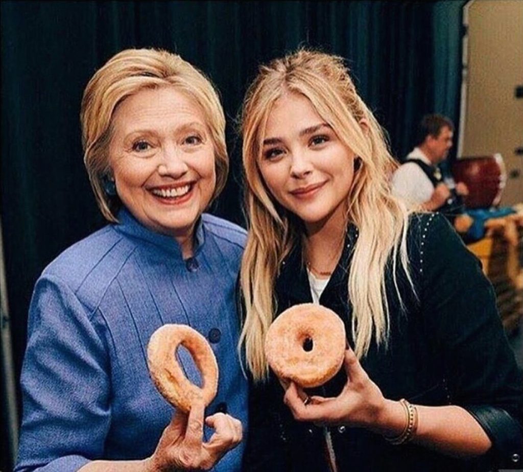 hillary clinton holding donut