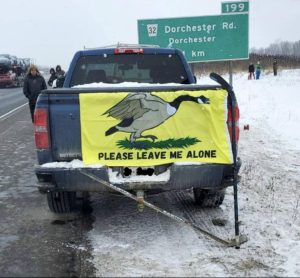 canada goose please leave me alone flag on pickup truck