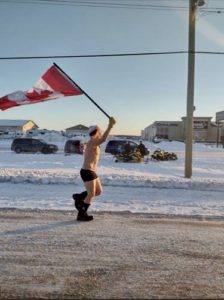 canadian protestor waving flag