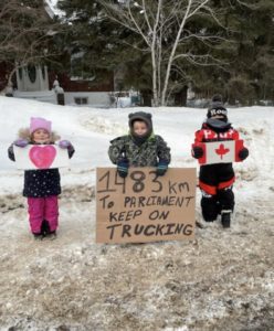 kids sign support canada trucker protest convoy