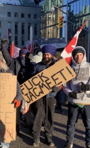 sikh protestor anti jagmeet sign