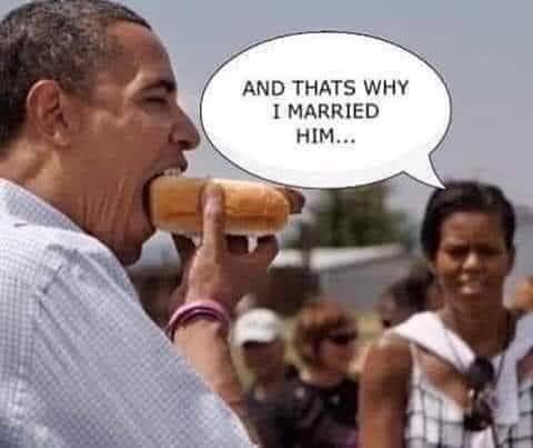 obama-eating-hot-dog-michelle-watching.jpg
