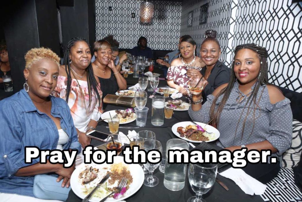 table-of-women-at-a-restaurant-pray-for-manager-1024x683.jpg