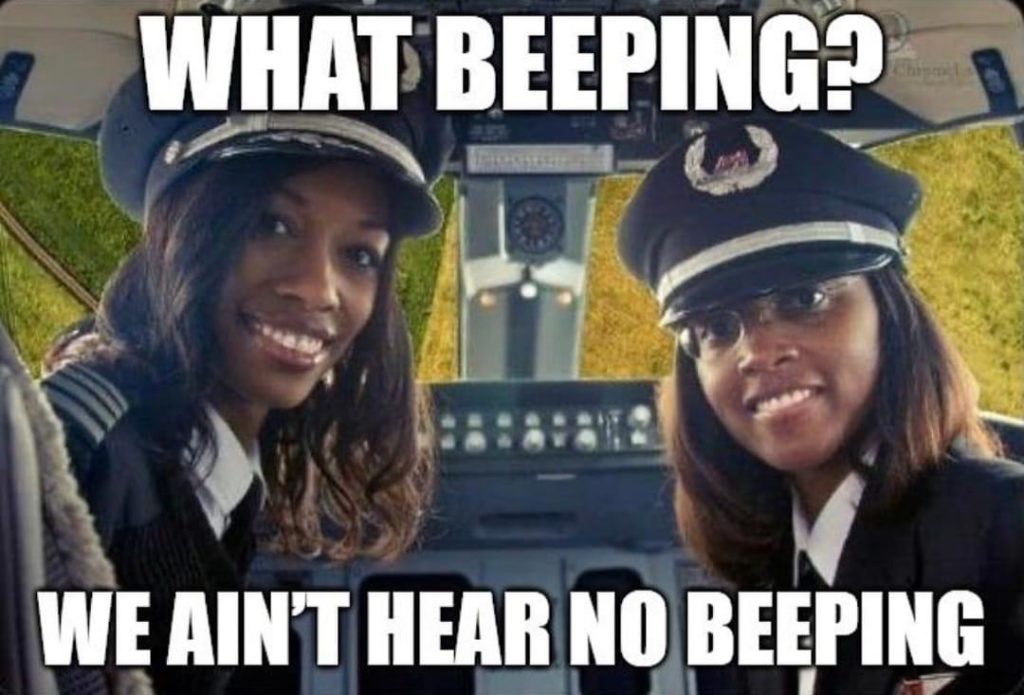 black-female-pilots-airline-in-airplane-cockpit-what-beeping-1024x695.jpeg