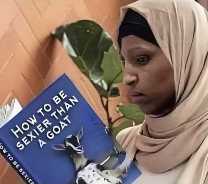 muslim-woman-reading-book-about-goats.jpg